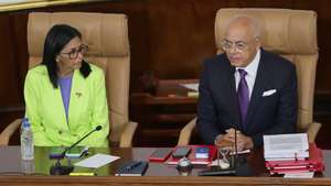 epa12652366 Venezuelan National Assembly President Jorge Rodriguez (R) speaks alongside acting president, Delcy Rodriguez, during Venezuelan President Nicolas Maduro's annual report to Parliament in Caracas, Venezuela, 15 January 2026. Rodriguez delivered the report as Maduro is currently detained in the United States along with his wife, Cilia Flores, after they were captured during a US military operation on 03 January 2026.  EPA/RONALD PENA R