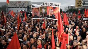 epaselect epa12460798 Supporters of former KLA leaders attend a mass rally organised by the Kosovo Liberation Army (KLA) veterans' association, in Tirana, Albania, 17 October 2025. Albanian Prime Minister Edi Rama urged support for former Kosovo Liberation Army (KLA) leaders, including former Kosovo President Hashim Thaci, who are on trial in The Hague on charges of war crimes and crimes against humanity allegedly committed during the 1998-1999 Kosovo War.  EPA/MALTON DIBRA