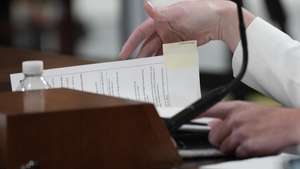 epa10039940 Cassidy Hutchinson, a former aide to White House Chief of Staff Mark Meadows, looks through her notes marked with a 'clarifications' during a public hearing of the House Select Committee to Investigate the January 6th Attack on the US Capitol, on Capitol Hill in Washington, DC, USA, 28 June 2022. Unlike several previous hearings, this hearing was announced only 24 hours in advance.  EPA/ERIC LEE