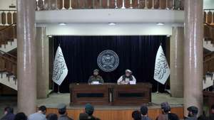 epa12791520 Spokesperson of Ministry of National Defense, Mufti Enayatullah Khwarazmi (L) and Deputy Spokesperson Mullah Hamdullah Fitrat (R) talk during a press conference in Kabul, Afghanistan, 03 March 2026. The deputy spokesman for the Islamic Emirate, Mullah Hamdullah Fitrat said that 110 civilians were killed and 123 injured in what he described as attacks by the Pakistani military in Afghanistan. He added that about 8,400 families have been displaced and that financial losses have been reported among the general population.  EPA/SAMIULLAH POPAL
