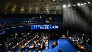 epa12599789 Brazilian senators attend a Senate session in Brasilia, Brazil, 17 December 2025. The Brazilian Senate approved a bill seeking to reduce the sentences of former president Jair Bolsonaro, who was sentenced to 27 years in prison, and other participants in the coup plot that followed the 2022 elections.  EPA/ANDRE BORGES