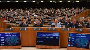 epa12850407 Results of the vote on proposals related to the EU-US trade deal are displayed during a plenary session of the European Parliament in Brussels, Belgium, 26 March 2026. MEPs voted on two proposals implementing the tariff aspects of the EU-US Turnberry trade deal.  EPA/Olivier Hoslet