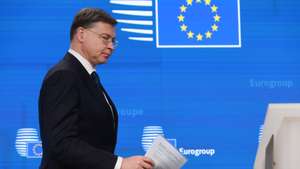 epa12853804 European Commissioner for Economy and Productivity Valdis Dombrovskis attends a press conference following an online Eurogroup meeting in Brussels, Belgium, 27 March 2026. Euro area finance ministers met via videoconference to discuss the economic outlook, fiscal coordination, and the impact of rising energy prices linked to tensions around Iran on inflation and growth, according to the official agenda.  EPA/OLIVIER HOSLET
