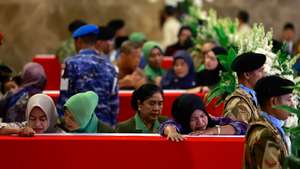 epa12868856 Relatives of the fallen Indonesian UN peacekeepers who were killed in Lebanon cry during a military honoring ceremony following the arrival of their bodies at Soekarno-Hatta airport in Tangerang, outskirts of Jakarta, Banten, Indonesia, 04 April 2026. Three Indonesian UN peacekeepers lost their lives in two incidents on March 29 and 30 while carrying out their duties in south Lebanon, according to the United Nations Interim Force in Lebanon (UNIFIL).  EPA/MAST IRHAM