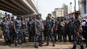 epa12171607 Police operate during a march to mark Democracy Day in Lagos, Nigeria, 12 June 2025. Each year, Nigeria marks 12 June as Democracy Day, commemorating the restoration of democracy in 1999.  EPA/EMMANUEL ADEGBOYE