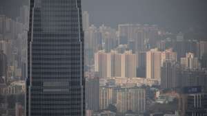 epa07574136 Two International Finance Centre (L), a commercial building designed with feng shui features, stands in Central, Hong Kong, China, 05 March 2019 (issued 16 May 2019). Feng shui, Chinese for 'wind' and 'water', is the ancient Chinese practice of aligning buildings and objects in their environment so that they attract good luck and ward off misfortune. The ancient practice plays a major role in Hong Kong's architectural development.  EPA/JEROME FAVRE