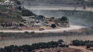 epaselect epa13070676 An Israeli military vehicle maneuvers on the Lebanese side of the Israel-Lebanon border, as seen from the Upper Galilee, 28 June 2026, amid an Israel-Lebanon ceasefire.  EPA/ATEF SAFADI