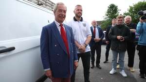epa13046103 Reform UK leader Nigel Farage (L) with Makerfield by-election candidate for Reform UK Rob Kenyon (2nd L) at a polling station in Wigan, Britain, 18 June 2026. A by-election is being held in the Parliamentary constituency of Makerfield, triggered by Labour MP Josh Simons stepping down to allow Mayor of Greater Manchester Andy Burnham to stand.  EPA/ADAM VAUGHAN