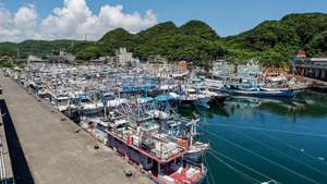 epa13099367 A general view of anchored fishing boats in anticipation of the approaching Typhoon Bavi in Keelung, Taiwan, 09 July 2026. Taiwan's Central Weather Administration (CWA) will issue a sea warning for Typhoon Bavi at 2:30 p.m. and, if its current track and speed hold, a land warning early on 10 July. As of 8 a.m. on 09 July, Bavi was 995 km east-southeast of Taiwan, moving northwest at 13 kph with sustained winds of 184 kph and gusts of up to 227 kph.  EPA/RITCHIE B. TONGO