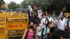 epa13122382 Supporters of the Cockroach Janta Party (CJP) march toward Parliament to demand the resignation of Union Education Minister over examination paper leak irregularities, in New Delhi, India, 20 July 2026. Demonstrators from the youth-led political movement gathered for the march following the forceful removal and hospitalization of activist and educator Sonam Wangchuk by police over health concerns after a three-week hunger strike.  EPA/RAJAT GUPTA
