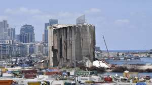 epa10781496 The damaged wheat silos are pictured ahead of the third anniversary of a huge explosion that hit the​ city of Beirut, Lebanon, 02 August 2023. At least 200 people were killed and more than 6,000 injured in the blast that devastated the port area of Beirut on 04 August 2020, believed to have been caused by an estimated 2,750 tons of ammonium nitrate stored in a warehouse. The silos are at risk of falling and residents living close to the port area have been warned by the Lebanese Health and Environment ministries to wear masks and stay indoors.  EPA/WAEL HAMZEH