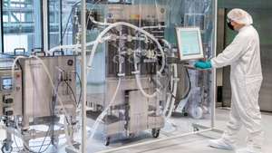 epa09014327 A handout photo made available by German pharmaceuticals company Bayer shows an employee at work in the future mRNA production site of CureVac's Corona vaccine CVnCoV at the Bayer AG plant amid the on-going Covid-19 pandemic, in Wuppertal, Germany, 15 February 2021. The production of the CureVac vaccine is to take place, among other places, at Bayer's 'Biotechnikum' in Wuppertal.  EPA/BAYER AG / HANDOUT  HANDOUT EDITORIAL USE ONLY/NO SALES