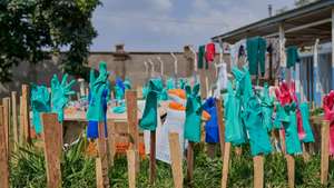 epa13127240 Rubber gloves dry in the sun at the Ebola treatment center of the General Hospital in Bunia, Ituri province, Democratic Republic of Congo, 22 July 2026. According to the World Health Organization (WHO), the province of Ituri remains the epicenter of the Bundibugyo variant of the Ebola virus, reaching almost 1000 deaths.  EPA/DIEUDONNE DIROLE