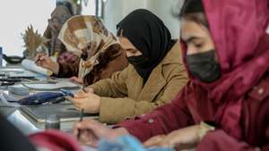epaselect epa13155220 Afghan girls attend a private painting and art class in Kabul, Afghanistan, 06 August 2026 (issued 07 August 2026). The class provides girls with an opportunity to continue learning and develop creative skills after being excluded from formal secondary education following the Taliban's return to power in August 2021. More than 2.2 million adolescent girls have been affected by the restrictions, prompting many to pursue alternative educational activities such as painting, handicrafts and other community-based learning initiatives to continue developing skills and maintain hope for their future.  EPA/SAMIULLAH POPAL