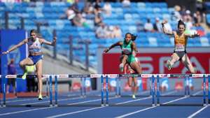 epa13160949 (L-R) Emma Zapletalova of Slovakia, Fatoumata Binta Diallo of Portugal, and Eileen Demes of Germany compete in the Women's 400m hurdles semifinals at the European Athletics Championships Birmingham 2026, Birmingham, Britain, 11 August 2026.  EPA/ADAM VAUGHAN