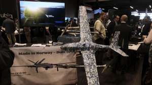 epaselect epa12997215 Industry representatives take part at the exhibition Cutting-Edge during the Drone Summit in Riga, Latvia, 27 May 2026. The Drone Summit 2026 is a high-level gathering dedicated to advancing drone technology, innovation, and defence cooperation. It gathers up to 2,000 participants from NATO and allied countries in one place, including political leaders from the international Drone Coalition and industry experts.  EPA/VALDA KALNINA