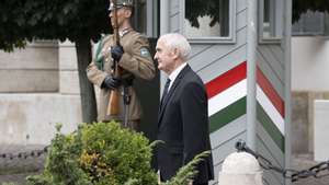 epa13178414 Hungary's new President Andras Baka (R) walks after symbolically bidding farewell to former interim head of state and current Parliament Speaker Agnes Forsthoffer (not pictured) at the Alexander presidential palace in Budapest, Hungary, 19 August 2026. Baka takes office as Hungary's president on 19 August after being elected by a parliamentary vote on 11 August, to succeed the recently removed head of state Tamas Sulyok.  EPA/ZSOLT SZIGETVARY HUNGARY OUT