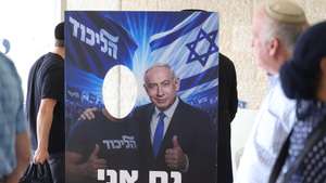 epa13175319 An election billboard featuring Israeli Prime Minister Benjamin Netanyahu is displayed as Likud Party members vote in the party's primary elections in Jerusalem, 17 August 2026. The primary will determine Likud's candidate list for the upcoming Knesset election.  EPA/ABIR SULTAN