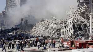 epa13210556 (FILE) - Fire and rescue workers search through the rubble of the World Trade Center in New York, USA, 13 September 2001 (reissued on 04 September 2026). On 11 September 2001, during a series of coordinated terror attacks using hijacked airplanes, two airplanes were flown into the World Trade Center's twin towers, causing the collapse of both towers. A third plane targeted the Pentagon, and a fourth plane heading towards Washington, DC ultimately crashed into a field. The 09/11 attacks were the deadliest terrorist attacks to occur on U.S. soil. In the days that followed, thousands of construction workers, firefighters, police officers, and volunteers flocked to the World Trade Center site to search for survivors and begin recovery efforts. Air travel came to a standstill, and people posted missing-person flyers all over the city as they moved through the dust and ash floating over Lower Manhattan  EPA/BETH A. KEISER / POOL / POOL *** Local Caption *** 57149225