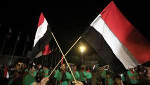 epa13253219 Scout members hold Yemeni flags during a ceremony marking the 12th anniversary of the Houthis' takeover of northern Yemen, in Sanaa, Yemen, 20 September 2026. The Houthis marked the 12th anniversary of their takeover of the capital, Sanaa, and much of northern Yemen, which prompted Saudi Arabia to intervene militarily in an effort to restore the internationally recognized government to power, sparking a prolonged conflict.  EPA/YAHYA ARHAB