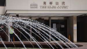 epa13253480 A security guard stands outside the High Court before the murder trial over the 2023 killing of Hong Kong model and socialite Abby Choi in Hong Kong, China, 21 September 2026. Choi’s former husband, Kwong Kong-chi (Alex Kwong), his father Kwong Kau and his brother Kwong Kong-kit (Anthony Kwong) are charged with murder and preventing the lawful burial of a body.  EPA/MAY JAMES