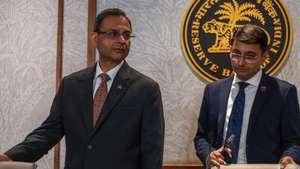 epa13286513 Reserve Bank of India (RBI) Governor Sanjay Malhotra (L) attends a press conference at the RBI headquarters in Mumbai, India, 07 October 2026. The Reserve Bank of India makes several announcements following its Monetary Policy Committee (MPC) meeting, including raising the repo rate by 25 basis points to 5.50 percent.  EPA/DIVYAKANT SOLANKI