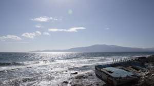 epa08266034 A view of the Agean sea with the Greek island of Lesvos in the background seen from the coast in Ayvacik district, Canakkale region, Turkey, 03 March 2020. Thousands of refugees and migrants are gathering on the Turkish side of the border with Greece with the intent to cross into the European Union following the Turkish government's decision to loosen controls on migrant flows after the death of 33 Turkish soldiers killed in an attack in Idlib, Syria on 27 February.  EPA/TOLGA BOZOGLU
