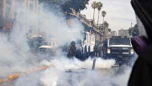 epa13314316 Protesters clash with police while they demonstrate to mark the seventh anniversary of the social uprising in the country, in Santiago, Chile, 18 October 2026.  EPA/Elvis Gonzalez
