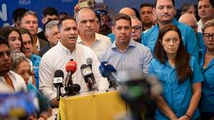 epa13315807 Carlos Fernandez, the national youth coordinator for Vente Venezuela, calls for marches across Venezuela to demand presidential elections during a press conference in Caracas, Venezuela, 19 October 2026. Fernandez said that the protests are also intended to demand the return of opposition leader Maria Corina Machado, who has been outside Venezuela since December of last year.  EPA/Ronald Pena R
