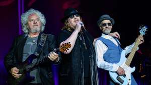 epa11489951 Steve Lukather, Joseph Williams and John Pierce (L-R) of the American rock band Toto perform during their concert at Veszpremfest festival in Veszprem, Hungary, 20 July 2024 (issued 21 July 2024).  EPA/Tamas Vasvari HUNGARY OUT