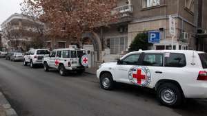 epa04013931 Vehicles of the International Committee for the Red Cross (ICRC) are seen in front of the international organization offices in Damascus, Syria, 10 January 2014. ICRC President, Peter Maurer, has begun a visit to Syria to assess the humanitarian situation and negotiate greater field access for the ICRC in the country. Maurer will hold talks in Damascus with a number of senior Syrian government officials and with the leadership and volunteers of the Syrian Arab Red Crescent, the ICRCâ€™s main partner in the country.  He will also be visiting people suffering the effects of the conflict to observe the situation first-hand.  EPA/YOUSSEF BADAWI