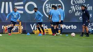 FC Porto head coach Sergio Conceicao (R) and his players Pepe (L) and Sergio Oliveira (2-L) leads a team's training session at Olival training centre in Vila Nova de Gaia, near Porto, Portugal, 18 October 2021. FC Porto will face AC Milan in their UEFA Champions League on 19 October 2021. ESTELA SILVA/LUSA
