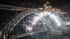 epa06046689 A view of fireworks over the Dom Luis I Bridge and the River Douro on the eve of St. John's festival (Festa de Sao Joao) in Porto, Portugal, 24 June 2017.  EPA/RUI FARINHA