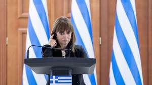 epa10496702 Visiting President of Greece, Katerina Sakellaropoulou, speaks during a joint media briefing with her hosting counterpart from Moldova during her official visit in Chisinau, Moldova, 01 March 2023.  EPA/DUMITRU DORU