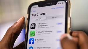 epa10732131 An employee downloads the newly unveiled Threads app on an iPhone at a design company in Chennai, India, 07 July 2023. Meta, the company behind Facebook and Instagram, said in a press release on 05 July 2023, that Mark Zuckerberg announced the initial version of 'Threads', an Instagram's text-based conversation app.  EPA/IDREES MOHAMMED