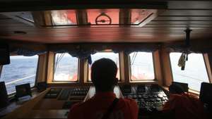 epa04121230 Indonesian Search And Rescue (SAR) members conduct a search operation for the missing Malaysian Airlines airplane in the Malacca straits, near Aceh Sea, Sumatera, Indonesia, 12 March 2014. The search for missing Malaysia Airlines flight MH370 was expanded, including more areas that were not on its flight path. Nearly 100 vessels and aircraft from 10 countries in Asia and the Pacific, including Malaysia, were scouring the South China Sea to locate the Boeing 777-200 that disappeared on en route to Beijing from Kuala Lumpur on 08 March.  EPA/HOTLI SIMANJUNTAK