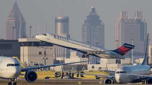 epa12506637 A Delta Air Lines flight departs from Hartsfield-Jackson Atlanta International Airport in Atlanta, Georgia, USA, 05 November 2025. The longest US federal government shutdown has resulted in travel delays nationwide for air passengers. Employees with the Transportation Security Administration (TSA) and Federal Aviation Administration (FAA) Air Traffic Control are among the 'essential workers' who are working without pay.  EPA/ERIK S. LESSER