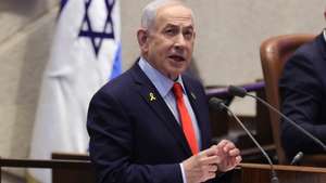 epa12629202 Israeli Prime Minister Benjamin Netanyahu speaks during a debate initiated by the opposition as part of a plenary session in the Knesset, the Israeli parliament, in Jerusalem, 05 January 2026. The title of the debate submitted by the opposition is 'An extremist government that acts contrary to the Zionist majority and harms national cohesion and the fundamental values of the State of Israel'.  EPA/ABIR SULTAN EPA