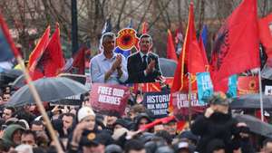 epa12750131 Supporters of former Kosovo Liberation Army (KLA) leaders hold cutouts depicting Hashim Thaci and Kadri Veseli during a rally in Pristina, Kosovo, 17 February 2026. Veteran organizations called for support for former Kosovo Liberation Army (KLA) leaders, including former Kosovo President Hashim Thaci, who are on trial in The Hague on charges of war crimes and crimes against humanity allegedly committed during the 1998–1999 Kosovo War.  EPA/GEORGI LICOVSKI