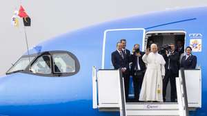 Pope Leo XIV waves goodbye as he embarks the papal plane for Equatorial Guinea at 4 de Fevereiro International Airport in Luanda, Angola, 21 April 2026. The Pope is on an eleven-day Apostolic Journey to Africa, with stops in Algeria, Cameroon, Angola, and Equatorial Guinea.JOSE SENA GOULAO/LUSA