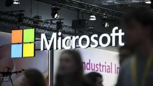 epa12902284 The Microsoft Logo can be seen at a booth at the Hanover Fair 2026 (Hannover Messe) in Hanover, Germany, 20 April 2026. The partner country is Brazil, which is positioning itself as a driving force for sustainable industrial transformation and renewable energy. Approximately 4,000 exhibitors and over 123,000 visitors from 150 countries are expected to attend.  EPA/HANNIBAL HANSCHKE
