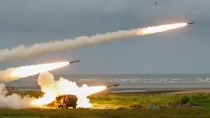epaselect epa13027504 Taiwan military US-made M142 High Mobility Artillery Rocket Systems (HIMARS) fire during 'heavy artillery firing and new weapon replacement verification firing training' in Taichung, Taiwan, 10 June 2026. The drill aimed to strengthen the combat capability of the Taiwanese military.  EPA/RITCHIE B. TONGO