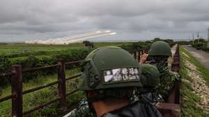 epa13027587 Taiwan Military observe US Made HIMARS (High Mobility Artillery Rocket System) fires during 'heavy artillery firing and new weapon replacement verification firing training' in Taichung, Taiwan, 10 June 2026. The drill aimed to strengthen the combat capability of the Taiwanese military.  EPA/RITCHIE B. TONGO