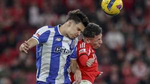 epa12804828 Benfica player Gianluca Prestianni (R) in action against FC Porto player Francisco Moura (L) during the Portuguese First League soccer match at Luz stadium in Lisbon, Portugal, 08 March 2026.  EPA/MIGUEL A. LOPES