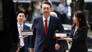 epa12756241 (FILE) - Former South Korean President Yoon Suk Yeol (C) arrives at court to attend a hearing to review his arrest warrant requested by special prosecutors in Seoul, South Korea, 09 July 2025 (re-issued 19 February 2025). A South Korean court found former President Yoon Suk Yeol guilty of masterminding an insurrection, sentencing the 65-year-old to life in prison for his botched attempt to impose martial law in December 2024.  EPA/KIM HONG-JI / POOL