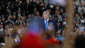 epa13170156 US President Donald Trump (C) arrives to make a speech on crime reduction and public safety at the Nassau County Police Academy in Garden City, Nassau County, on Long Island, New York, USA, 14 August 2026. Trump used the event to highlight newly released FBI crime data showing a decrease in violent crime across the nation for 2025.  EPA/OLGA FEDOROVA