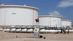 epa03833857 The oil storage tanks at Zawiya Oil Refinery some 40 kms west of Tripoli, Libya, 22 August 2013. The oil port of Zawiya has remained open while others ports in Libya were closed due to labour disputes.  EPA/SABRI ELMHEDWI