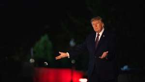 epa13278005 United States President Donald Trump motions to new pavement as he arrives on the South Lawn in Washington, DC, USA, 02 October 2026.  EPA/Annabelle Gordon / POOL