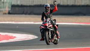 epa13295945 First Winner Aprilia Racing MotoGP rider Marco Bezzecchi of Italy celebrates after winning the MotoGP race at the Motorcycling Grand Prix of Indonesia at Mandalika Circuit in Mandalika, Indonesia, 11 October 2026.  EPA/MAST IRHAM