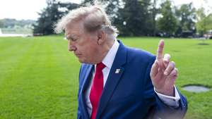 epaselect epa13309727 US President Donald Trump gestures to reporters as he departs the White House for a rally in Georgia, in Washington, DC, USA, 16 October 2026. President Trump will participate in a midterm rally in Dalton, Georgia, in support of local candidates Rick Jackson and Rep. Mike Collins.  EPA/JIM LO SCALZO
